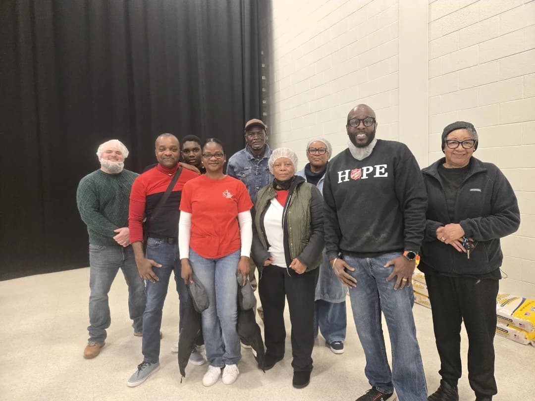 CJ Turrentine with community members after a service event
