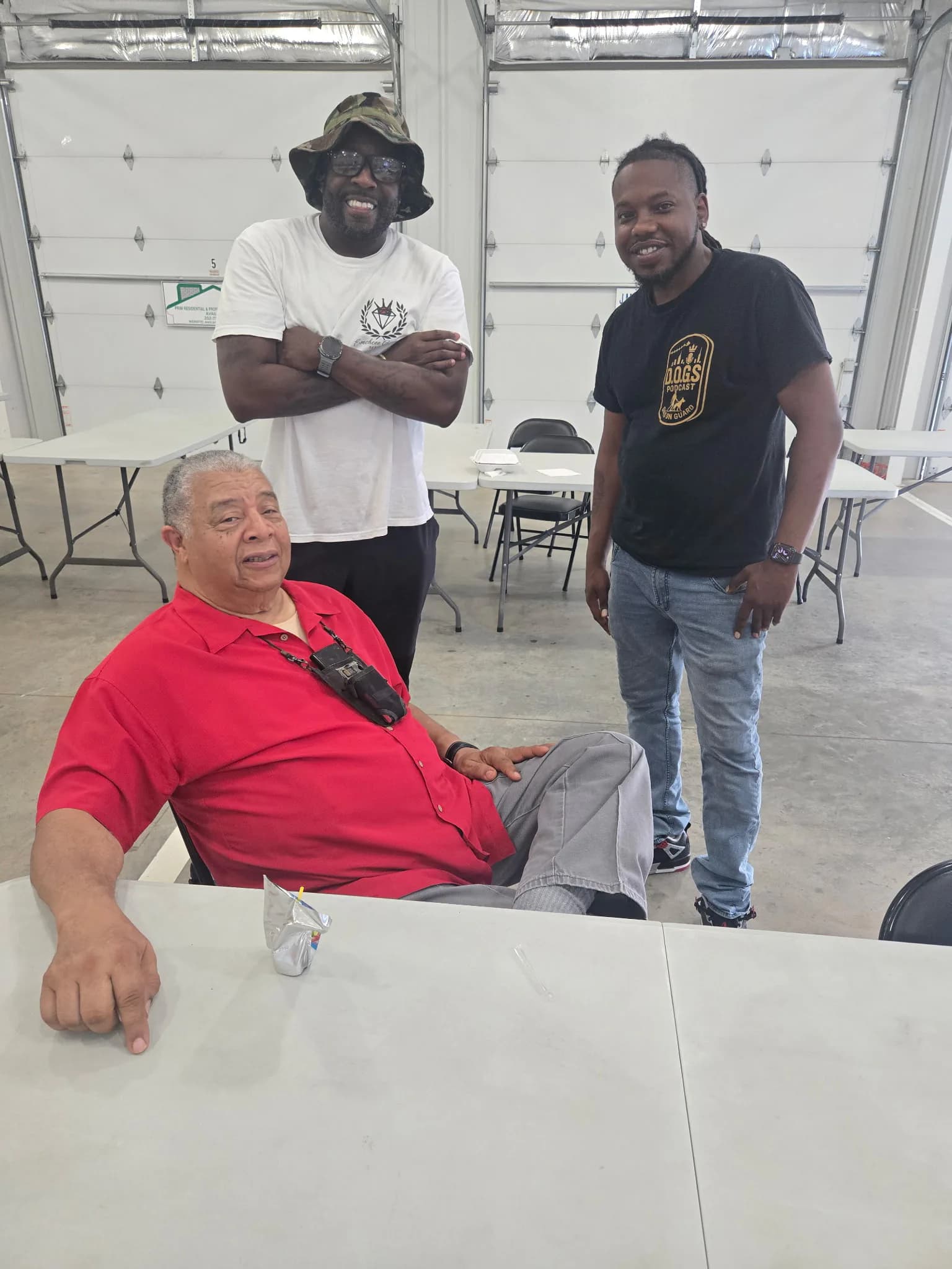 CJ Turrentine talking with neighbors at a community gathering