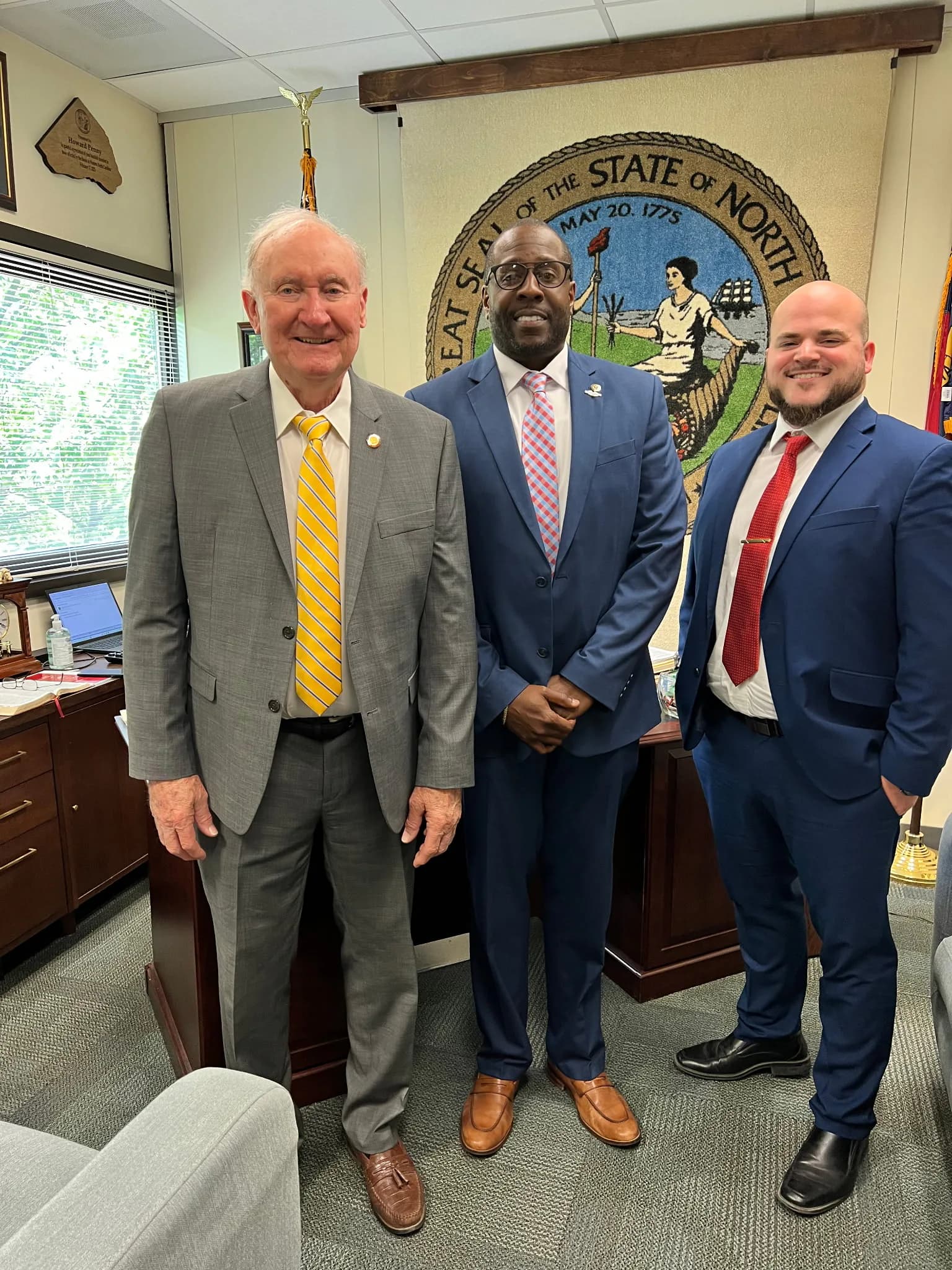 CJ Turrentine with public leaders during a North Carolina visit